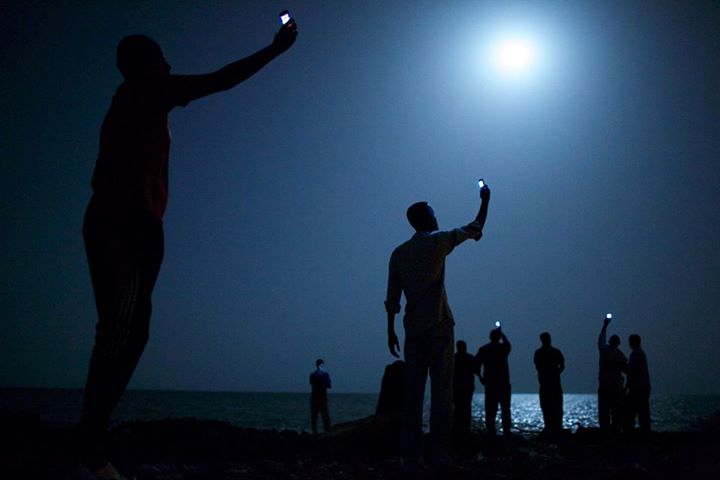... WORLD PRESS PHOTO OF THE YEAR ...

In this photo provided on Friday Feb. 14, 2014 by World Press Photo, the World Press Photo of the Year 2013 by John Stanmeyer, USA, VII for National Geographic, shows African migrants on the shore of Djibouti city at night, raising their phones in an attempt to capture an inexpensive signal from neighboring Somalia in Djibouti City, Djibouti, Feb. 26, 2013. (AP Photo/John Stanmeyer, VII for National Geographic)